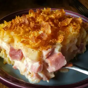 Cheesy ham and potato bake, ham potato casserole, leftover ham casserole, creamy ham and potato dish, baked ham and potato casserole