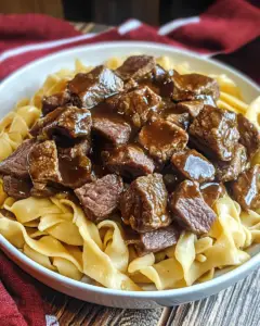 tender beef tips recipe, beef tips in gravy, easy beef tips and noodles, hearty beef noodles, beef and egg noodles recipe