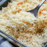 oven baked rice, baked rice recipe, easy rice recipe, fluffy baked rice, rice cooking in oven, no-fail rice recipe, baked rice with broth