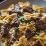 beef pasta recipe, creamy bowtie pasta, ground beef pasta skillet, one-pot pasta recipe, creamy beef farfalle