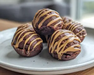 mini brownie cups, chocolate peanut butter bites, fudge brownie bites, buckeye brownie bites, bite-sized brownie desserts