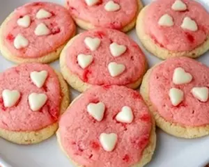 strawberry Valentine cookies, heart-shaped cookies, festive strawberry cookies, pink Valentine’s Day cookies, strawberry sugar cookies, romantic cookies for Valentine’s Day