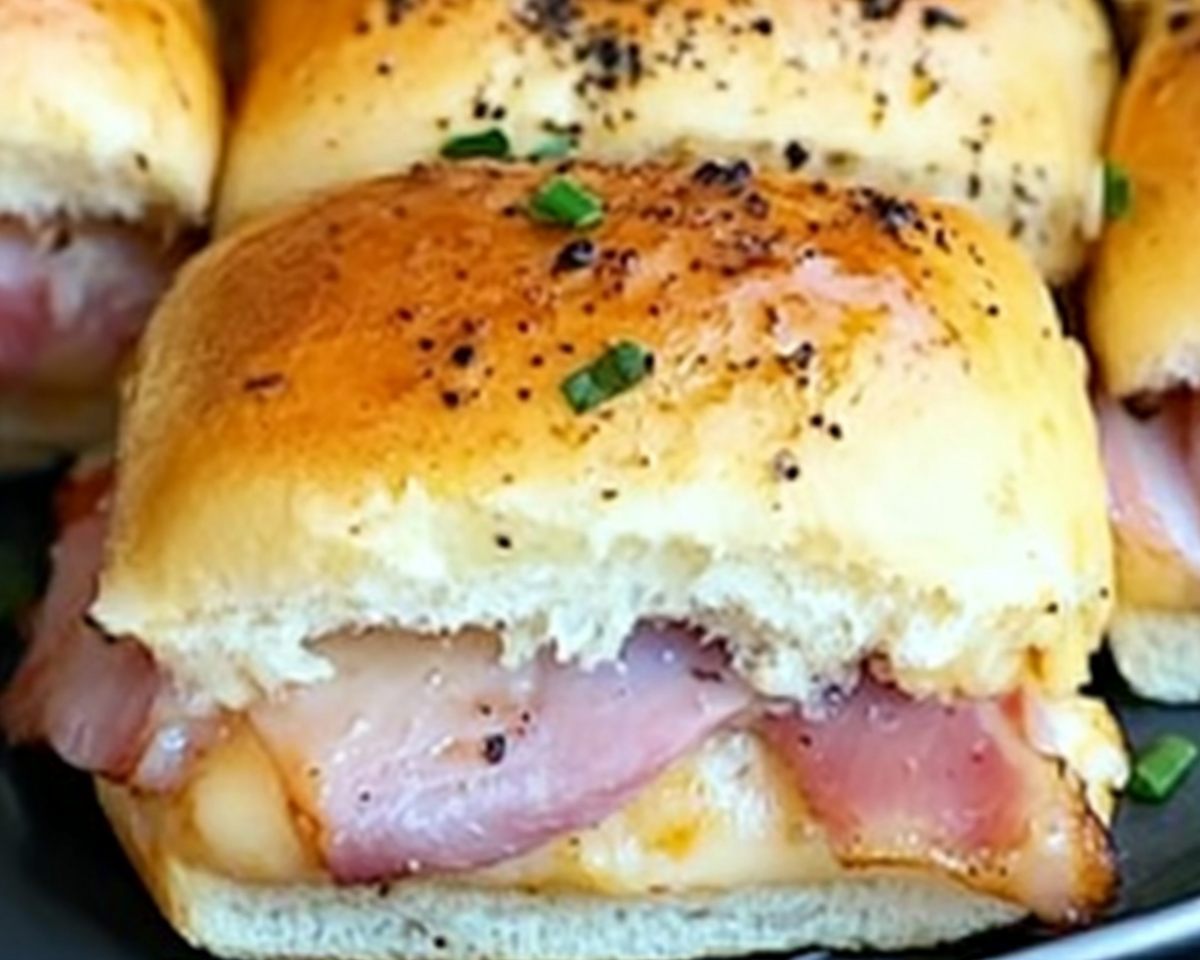 ham and cheese sliders, sweet roll sliders, party appetizer sliders, baked ham sliders, quick slider recipes, savory Hawaiian rolls